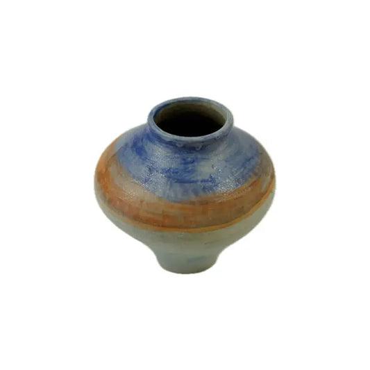 A small, round pottery vase with blue and orange stripes, featuring a narrow neck and a smooth, glossy finish.