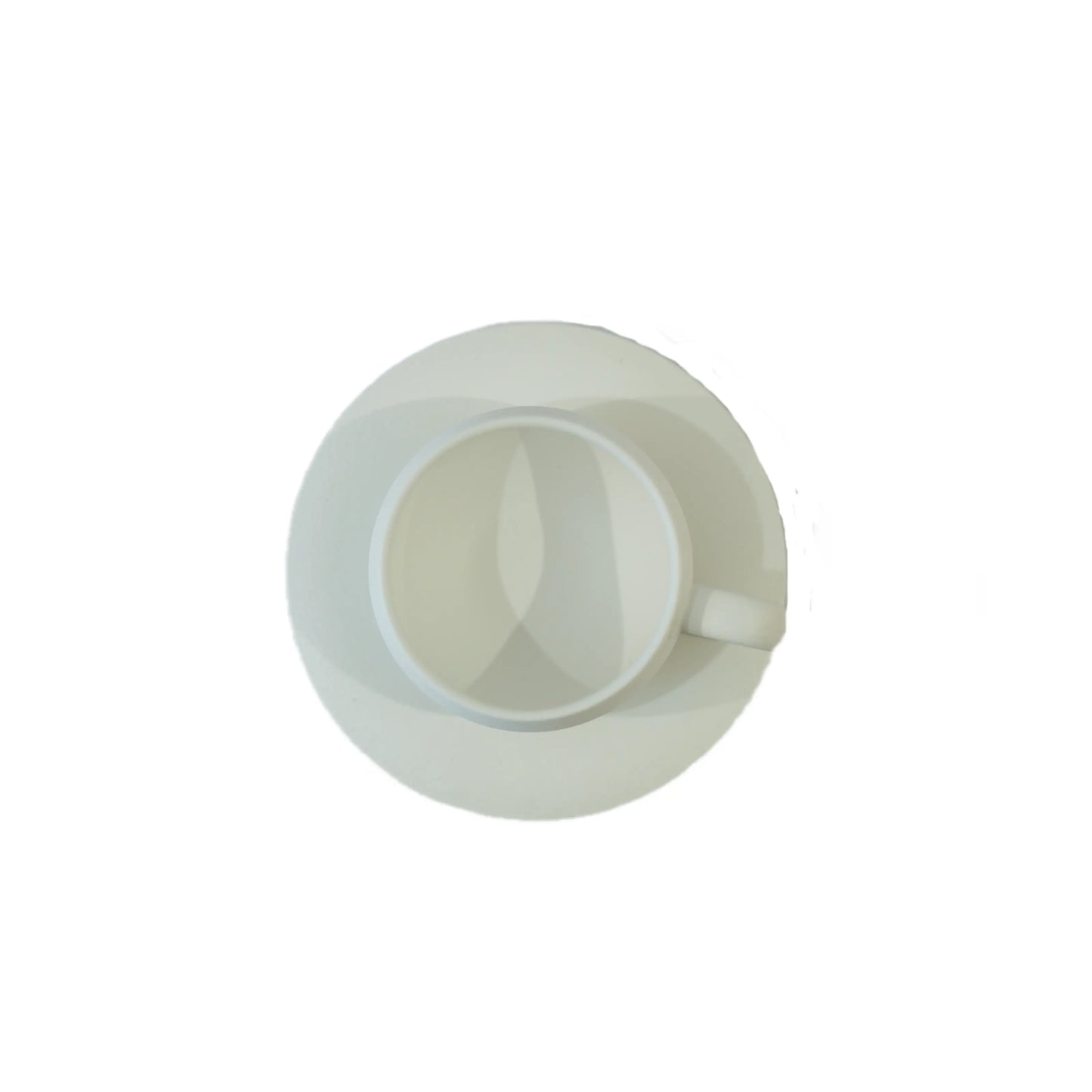 A top-down view of a simple white coffee cup and saucer set against a blank background.