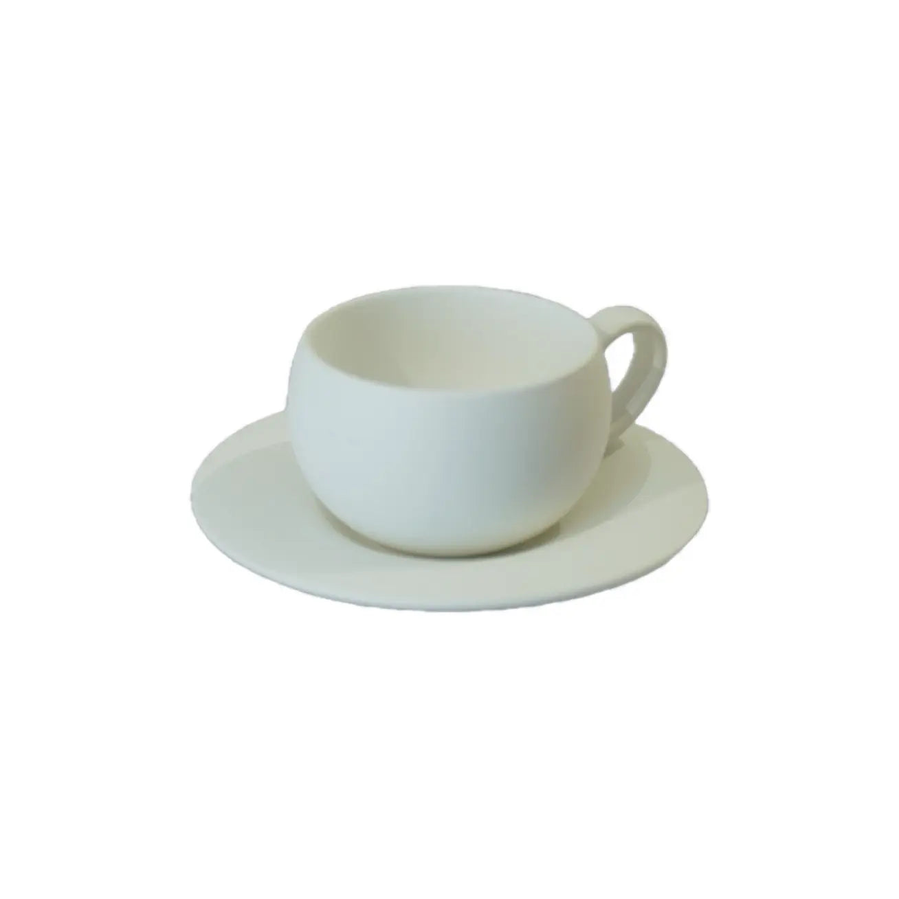 A simple, elegant white coffee cup with a handle sits on a matching saucer against a plain background.