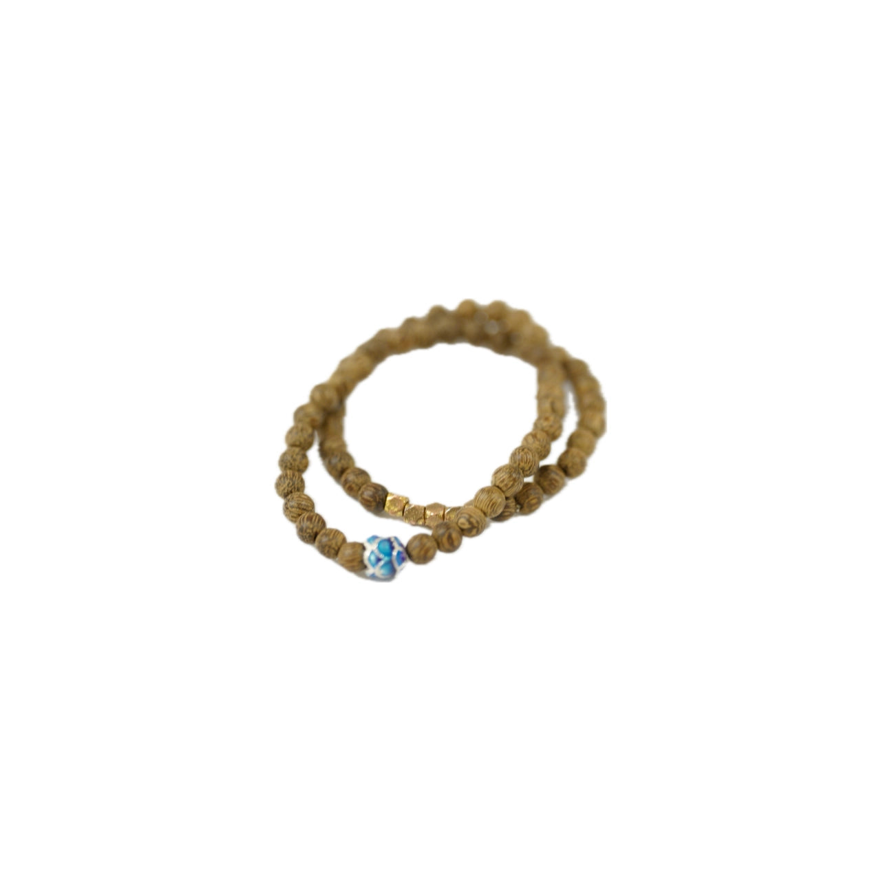 handcrafted wooden bead bracelet offers a smooth, refined touch and a subtle natural aroma that calms the senses on white background.