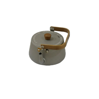 Aluminium kettle 1.1L with a wooden handle on a white background