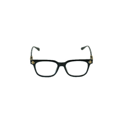 Black cat-eye glasses with gold accents on a white background