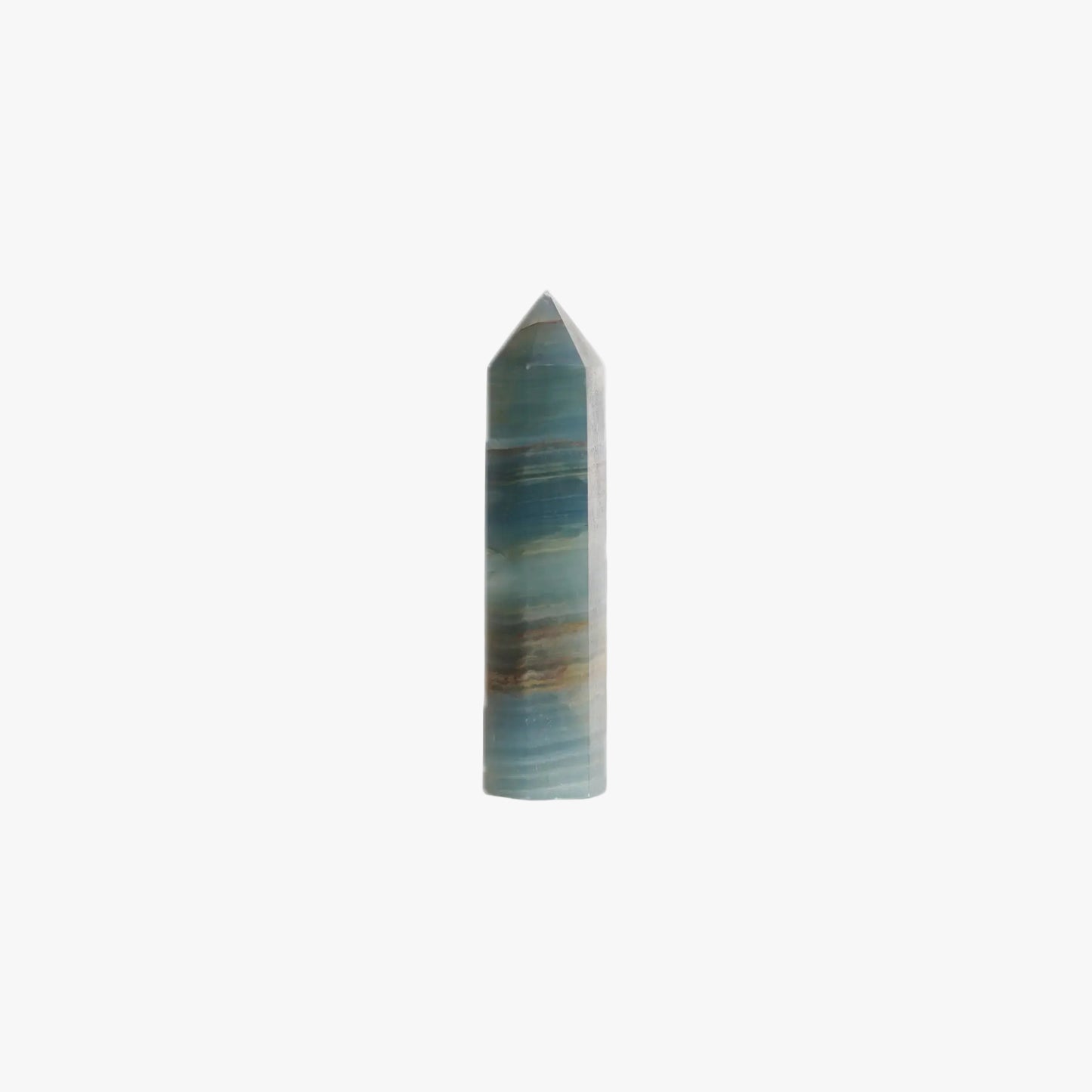 blue onyx crystal point tower on a white background