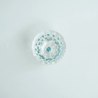 Bird view of Crystal Turquoise Faceted Cup 65ml on  grey background