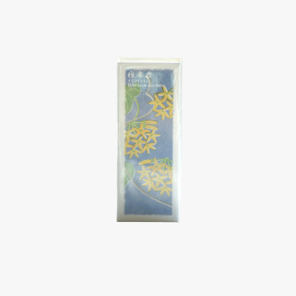 A packaged Kousaido Ikadenshin Japanese Incense with a blue and green floral design and gold calligraphic accents, shown in a clear plastic sleeve against a plain white background.
