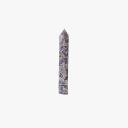 A polished pointed Large Chevron Amethyst Tower · Healing, Intuition & Energetic Cleansing, likely amethyst, featuring a marbled pattern of purple, gray, and white, centered on a plain white background.