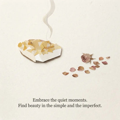 A minimalist beige-toned illustration showing a small steaming cup or bowl with gold and cream geometric facets, a single rose, scattered petals, and the text, 'Embrace the quiet moments. Find beauty in the simple and the imperfect.