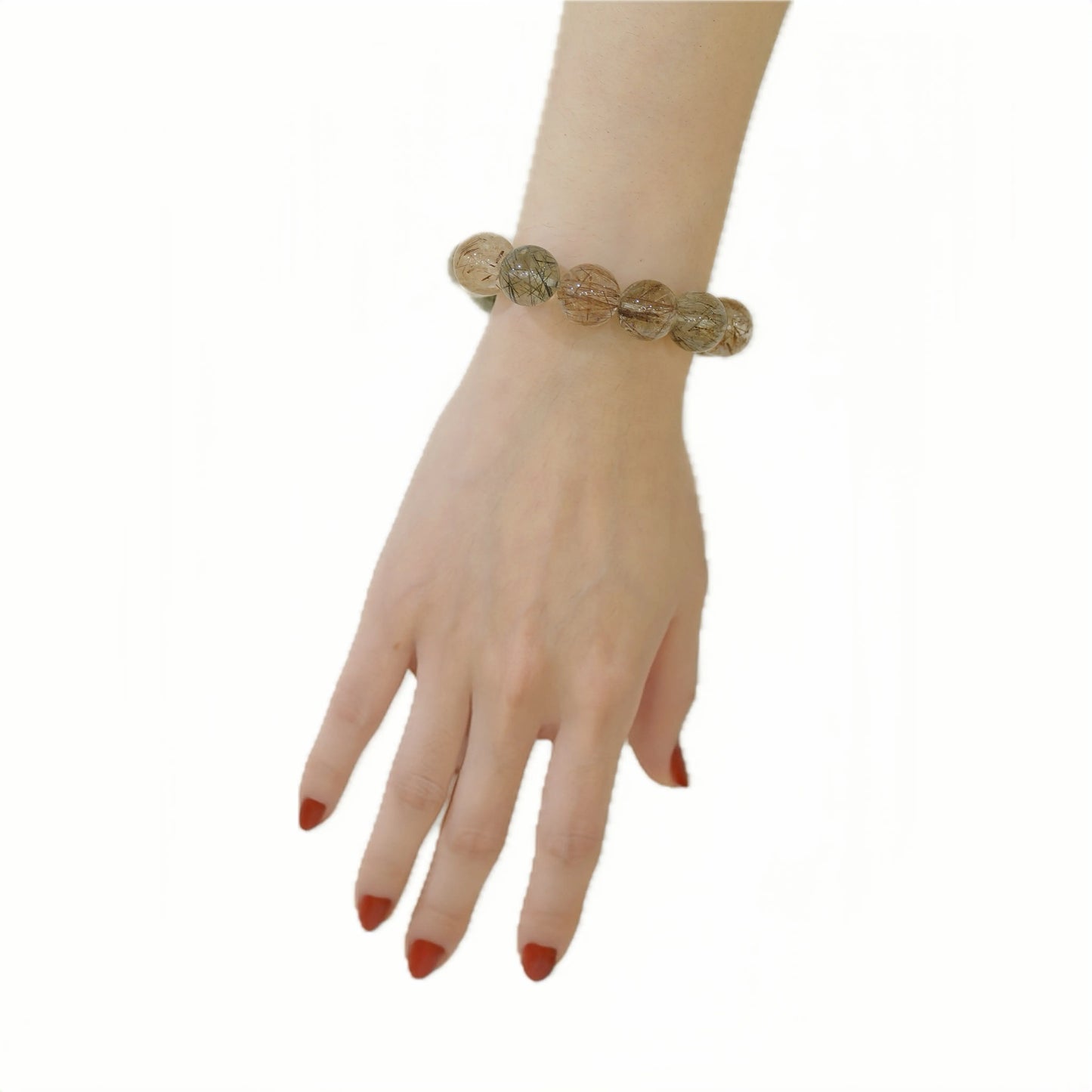 Healing crystal bracelet copper and green rutile worn by model