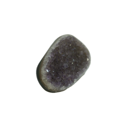 Natural flat amethyst cluster slice with raw crystal surface and polished edge, side angle view