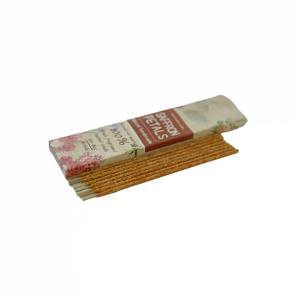 Packaged spice sticks with a label on a white background