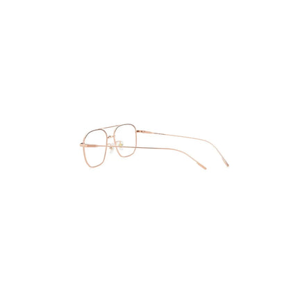 Rose gold eyeglasses on a white background