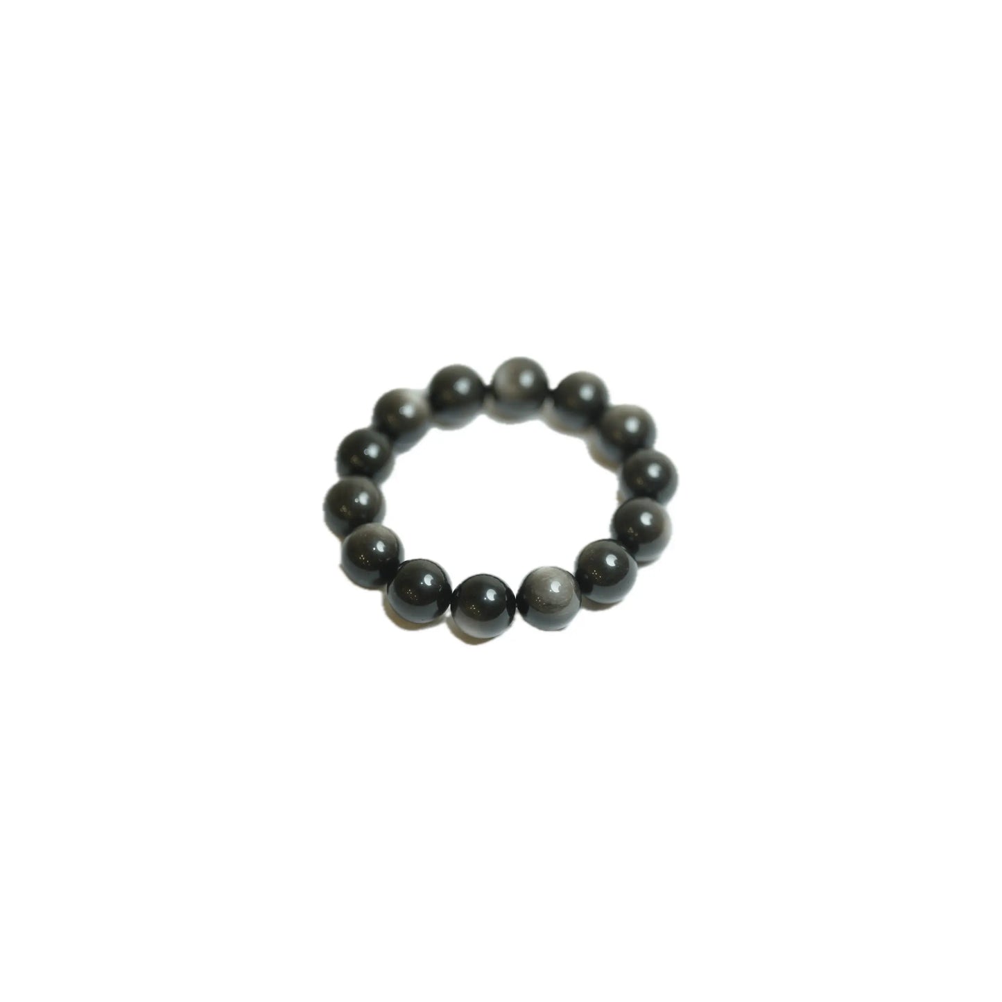 Angled product shot of the substantial 18mm Silver Sheen Obsidian crystal bracelet, highlighting the unique glossy finish and energetic presence of each genuine gemstone bead at Singoau.