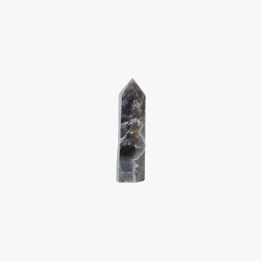 A polished natural crystal point, identified as dream amethyst tower, featuring a dark gray body with white and light purple matrix inclusions, centered on a solid white background.