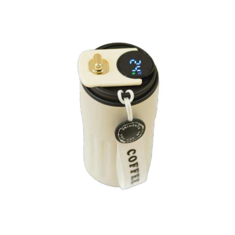 A cream-colored insulated coffee mug with a digital temperature display and a removable strap marked "COFFEE."