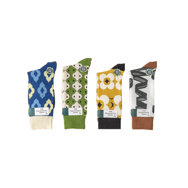 A display of four colorful patterned socks, showcasing unique designs in blue, green, yellow, and brown, labeled "THE Characteristic Socks."
