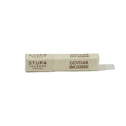 Incense stick with 'Stupa' branding and 'Devdar' scent on a white background