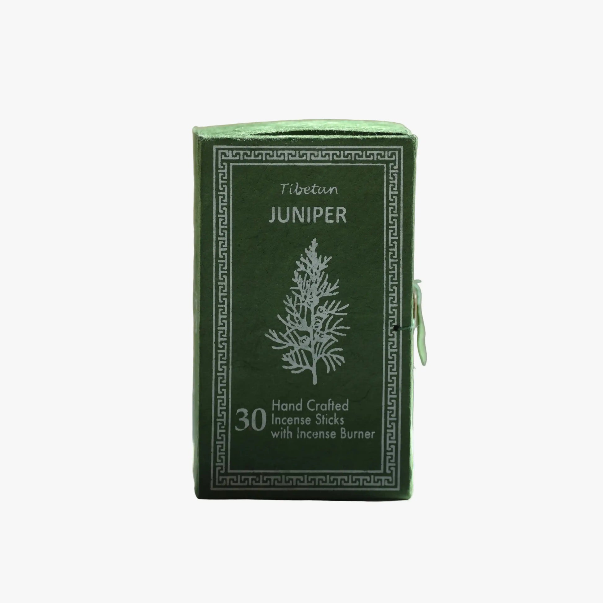 A green rectangular box of Tibetan Juniper incense sticks with white printed text and a tree illustration, shown on a plain light gray background.
