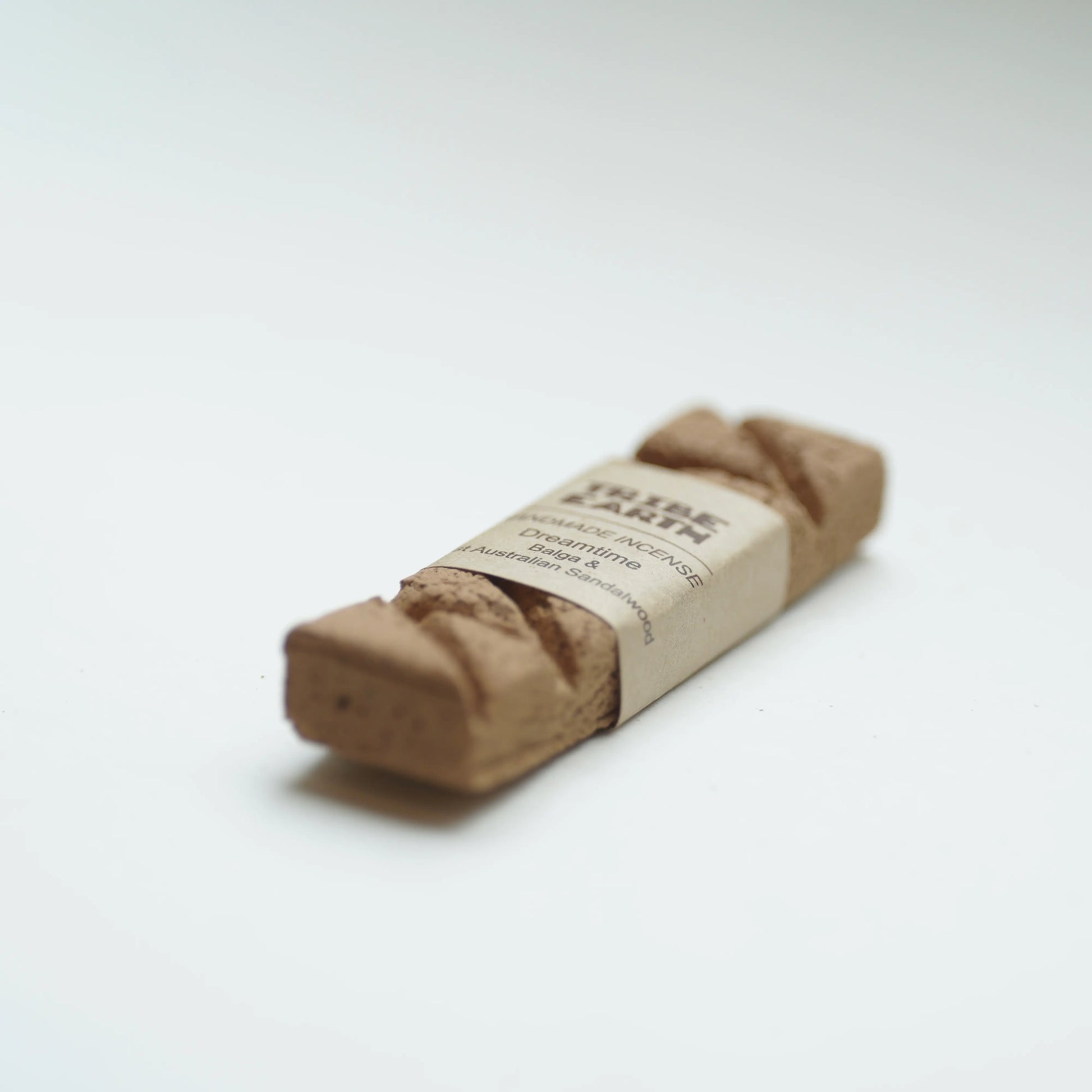 A Tribe earth dreamtime incense photographed on a clean white background.
