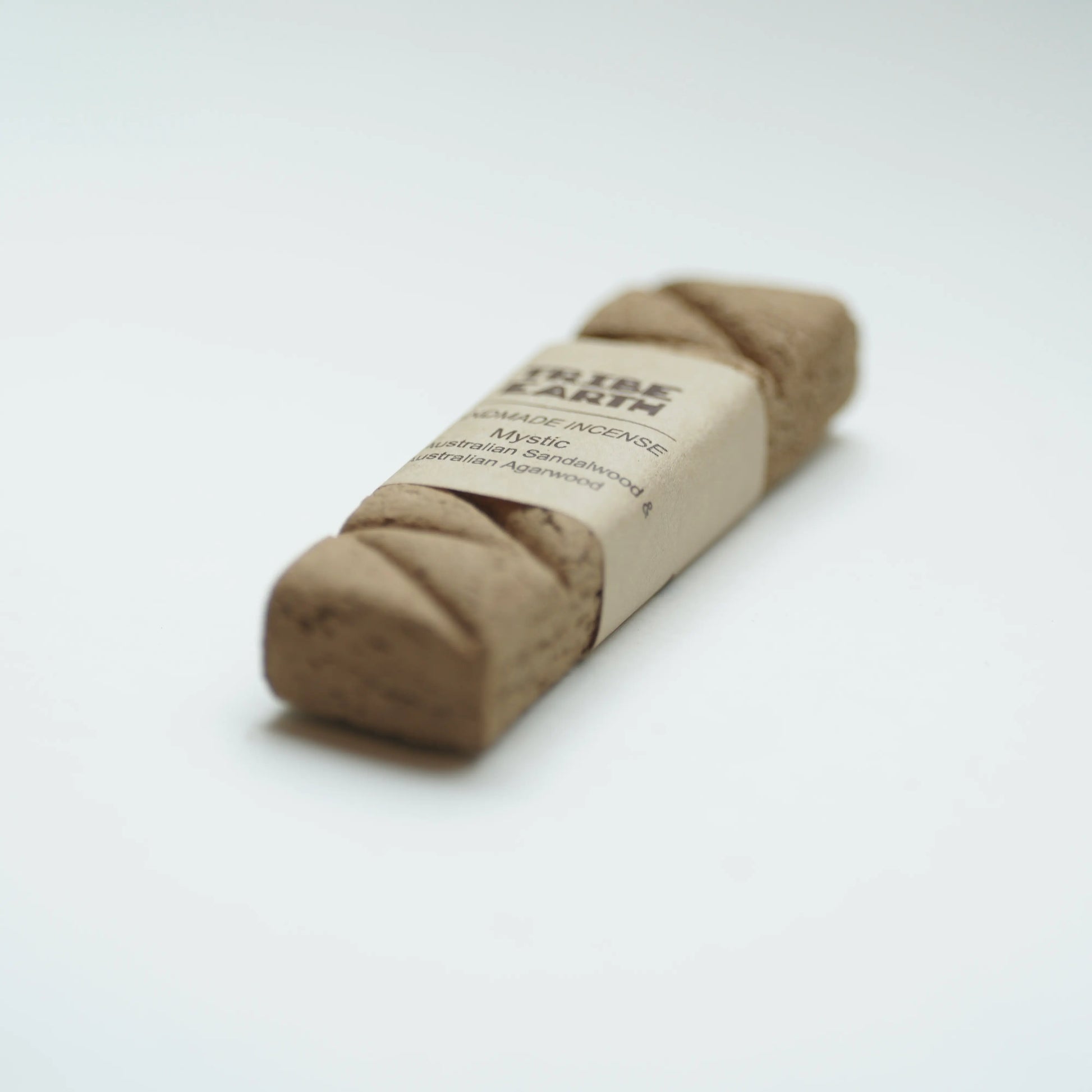 A Tribe earth mystic incense on a clean white background.