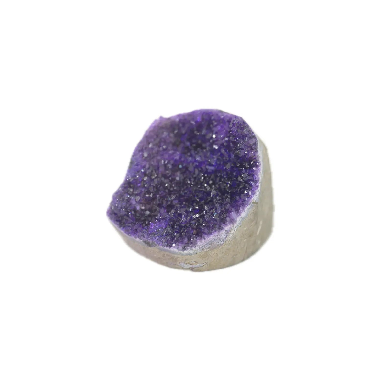 A natural amethyst geode dome with a deep purple crystal interior and a light gray stone base, shown on a plain white background.