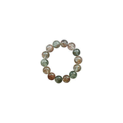Handcrafted natural crystal bracelet featuring Copper and Green Rutilated Quartz beads for wealth attraction and career success, styled for mindful living at Singoau