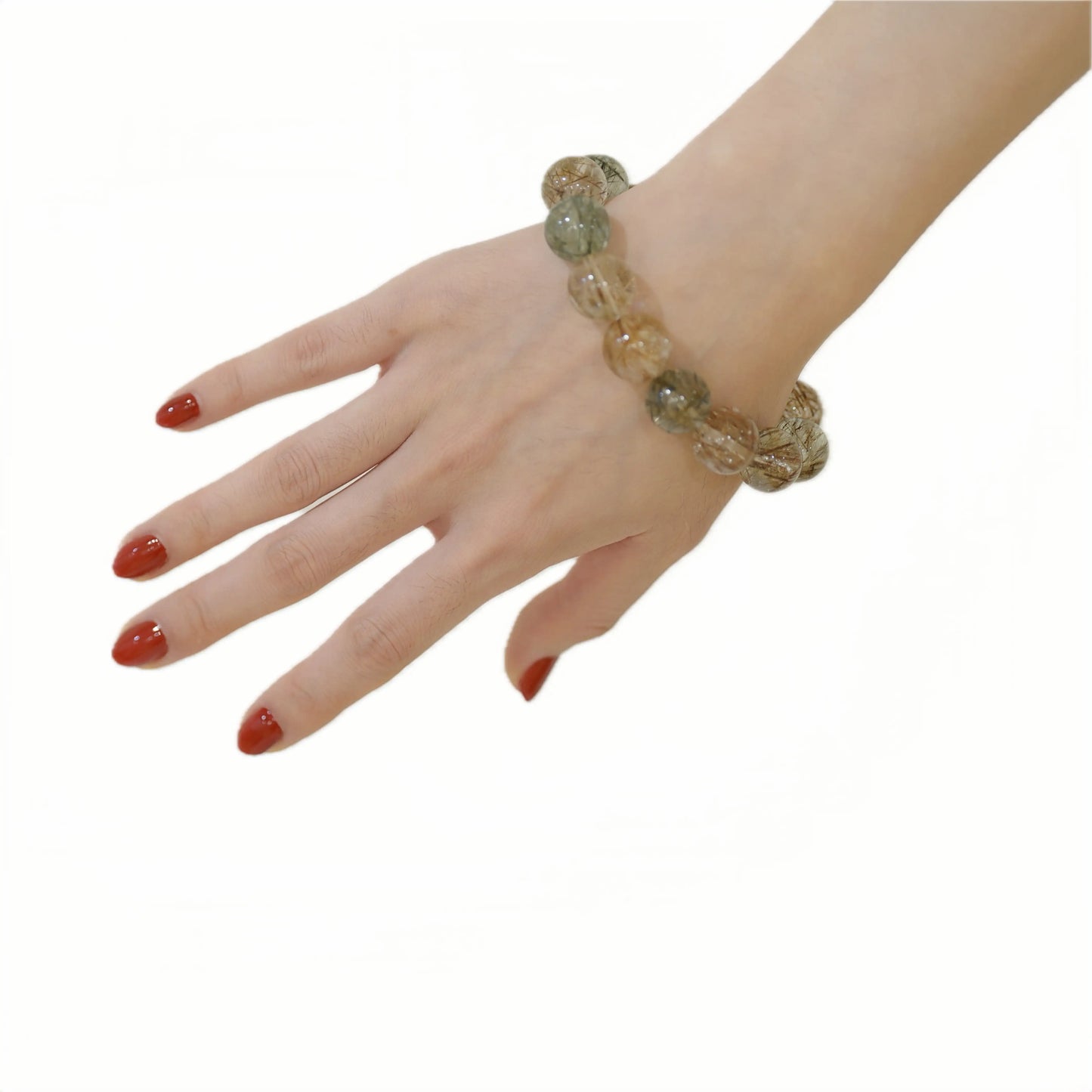 Natural copper and green rutilated quartz crystal bracelet worn on wrist for wealth and prosperity energy
