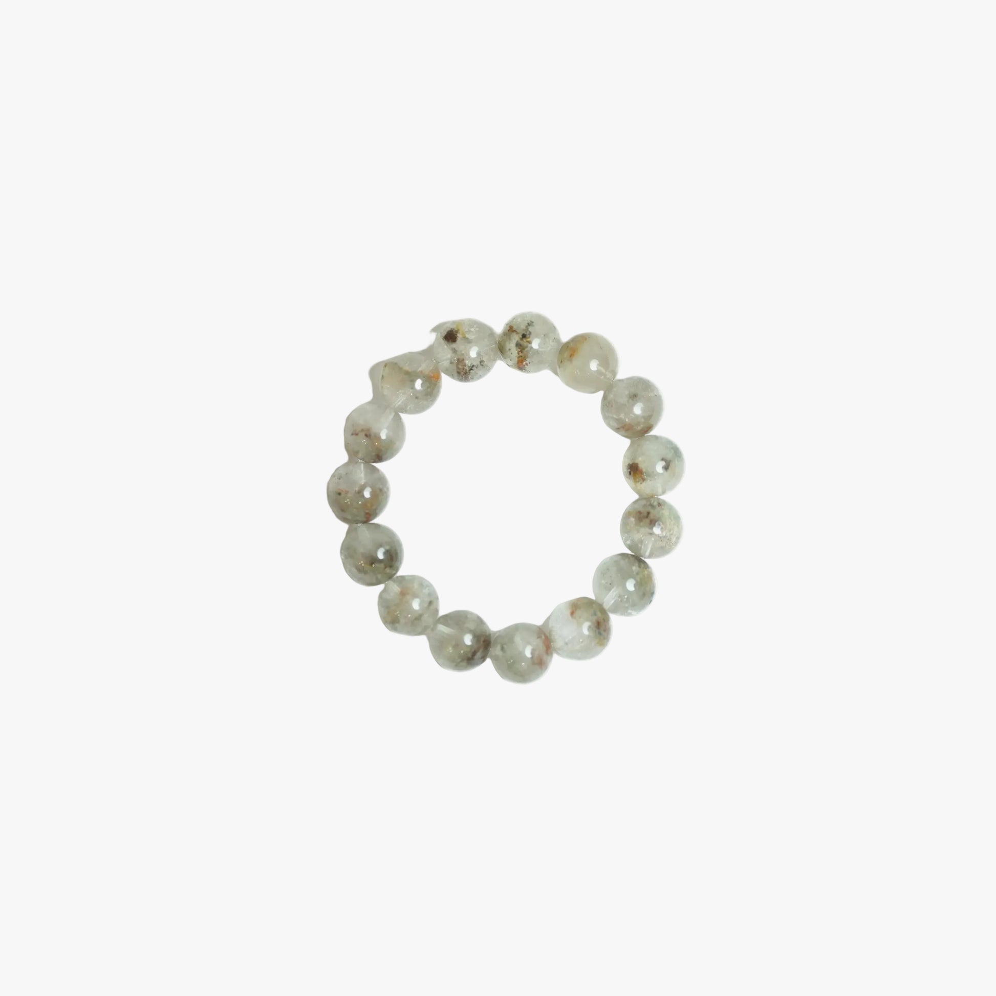 Handpicked 18mm Green Phantom Quartz crystal bracelet viewed top-down against a white background, displaying scenic natural inclusions and high clarity for heart chakra restoration at Singoau.