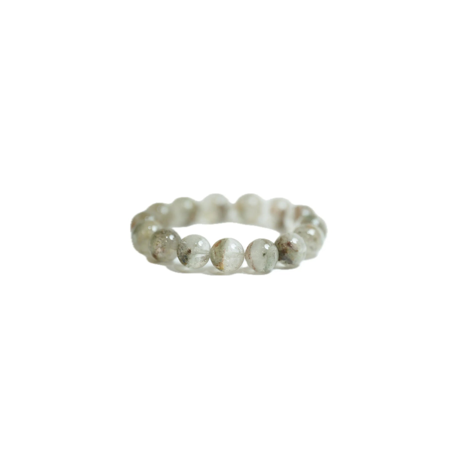 Profile view of the 18mm Monet Green Phantom Quartz healing crystal bracelet against a clean white background, highlighting the glossy finish and intricate internal green mineral formations designed for career growth and manifestation.