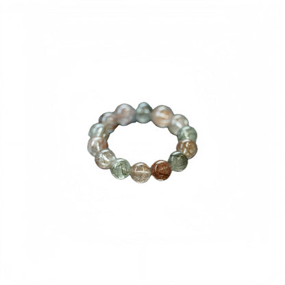 Nature crystal beaded bracelet with multicolored beads on a white background