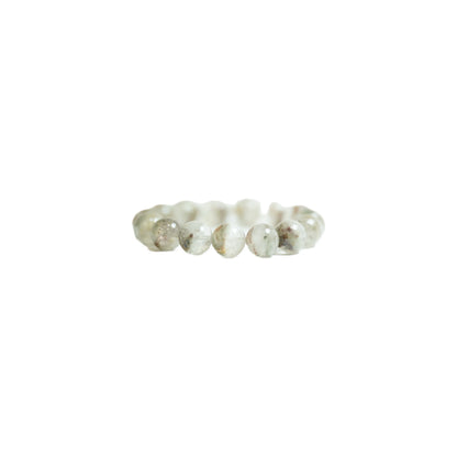 Straight-on profile view of the premium 18mm scenic Green Phantom Quartz bracelet against a crisp white background with a soft shadow, illustrating its strong presence and stabilizing energy for meditation and daily mindfulness at Singoau.