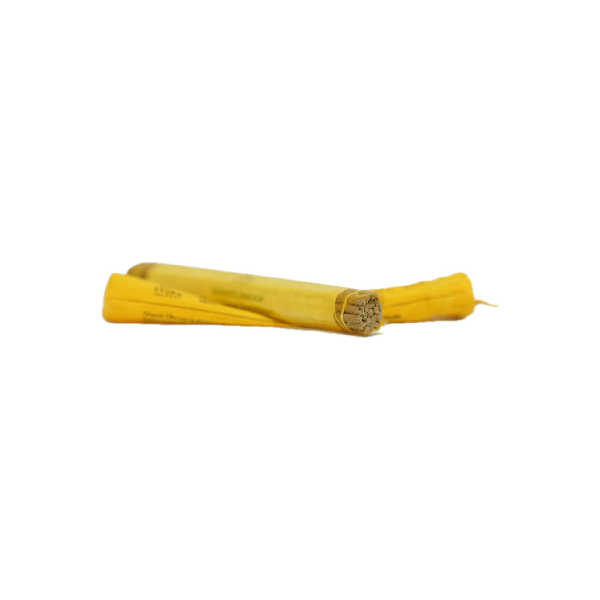 Frontal profile of the open STUPA Day Time incense tube, showcasing the texture and uniform appearance of the natural herbs, leaves, and barks that create the steady Juniper aroma.
