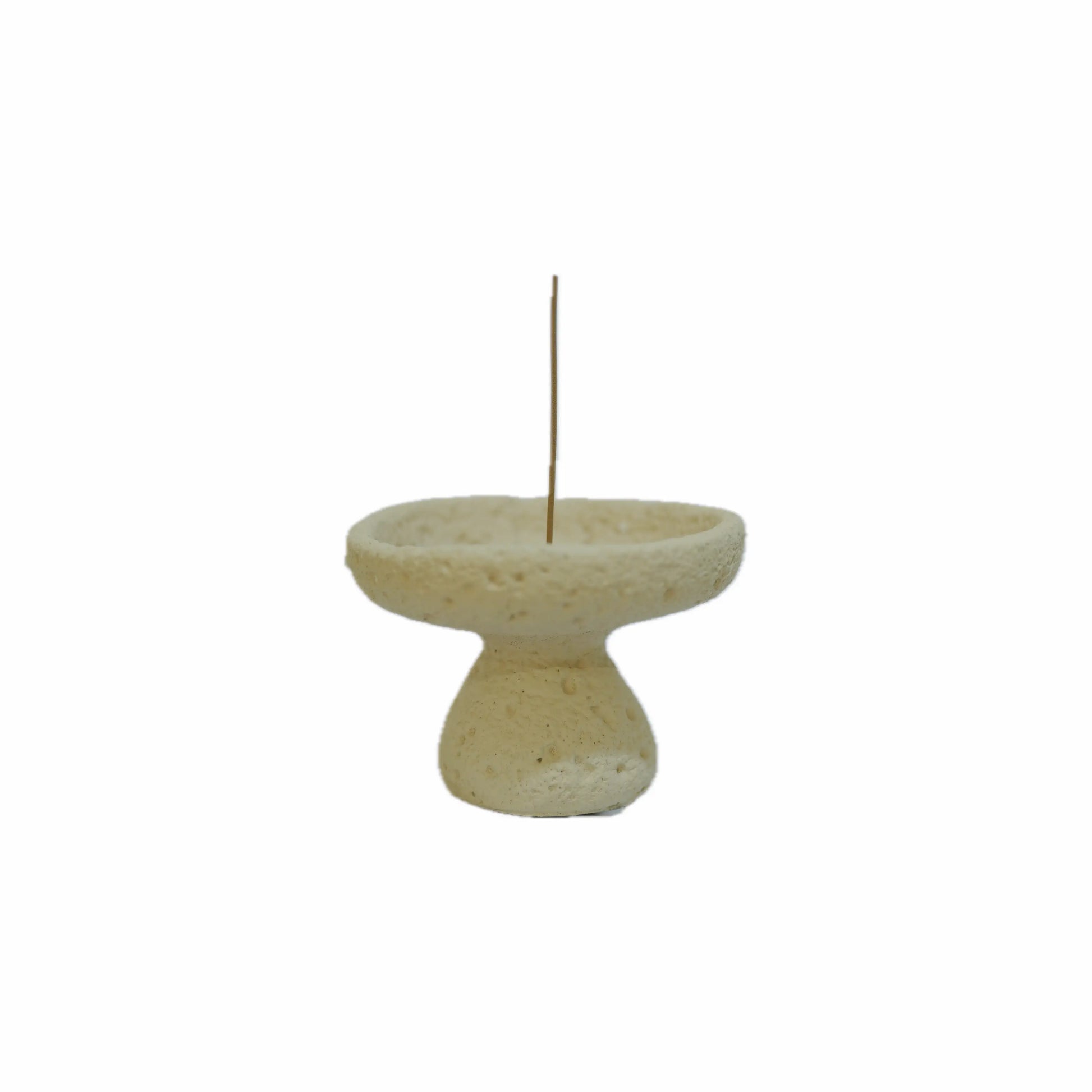 Side profile of the Vortex cement incense, highlighting the raw concrete material and pedestal base for office or studio spaces.